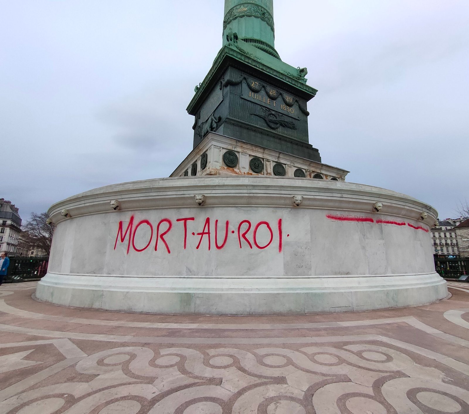 Death to the king graffiti seen in Paris