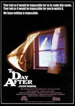 Poster for the 1983 television film The Day After, featuring a window blown open by a blast, its curtains billowing inward. Outside, a bright white light fills the dark sky. The tagline reads: “They told us it would be impossible for us to make this movie. They told us it would be impossible for you to watch it. We hope nothing is impossible.” The overall tone is ominous and foreboding, invoking the dread of nuclear war.